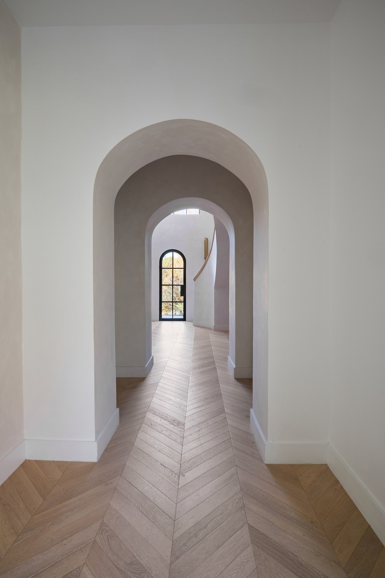 Chevron herringbone hardwood hallway